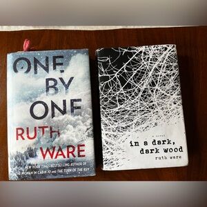 Two amazing hardcover books by Ruth Ware! One by One and in a dark, dark woods!